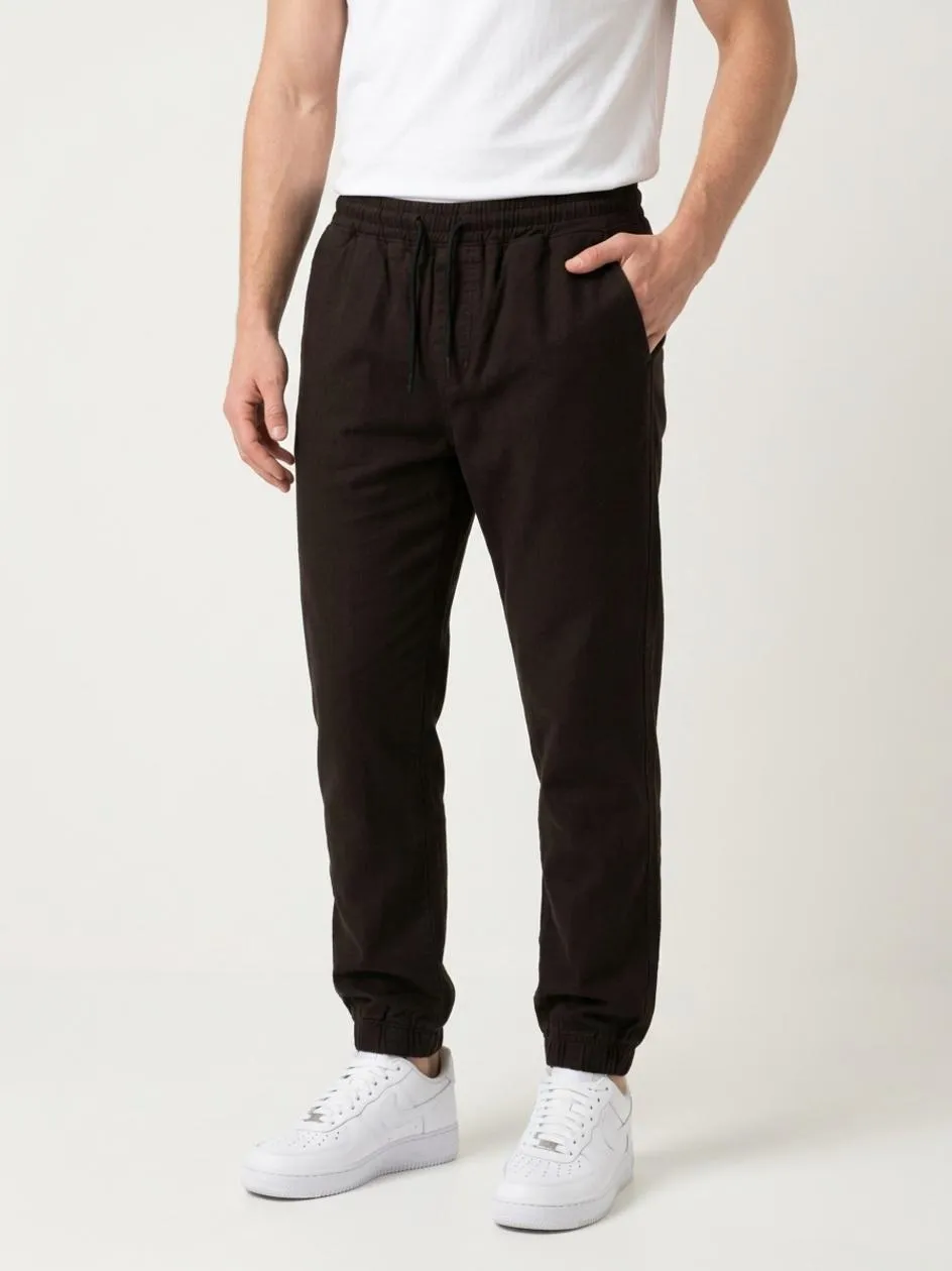 spodnie-materialowe-jogger-meskie-ciemne-brazowe-jigga-wear-crown_4 (1).webp